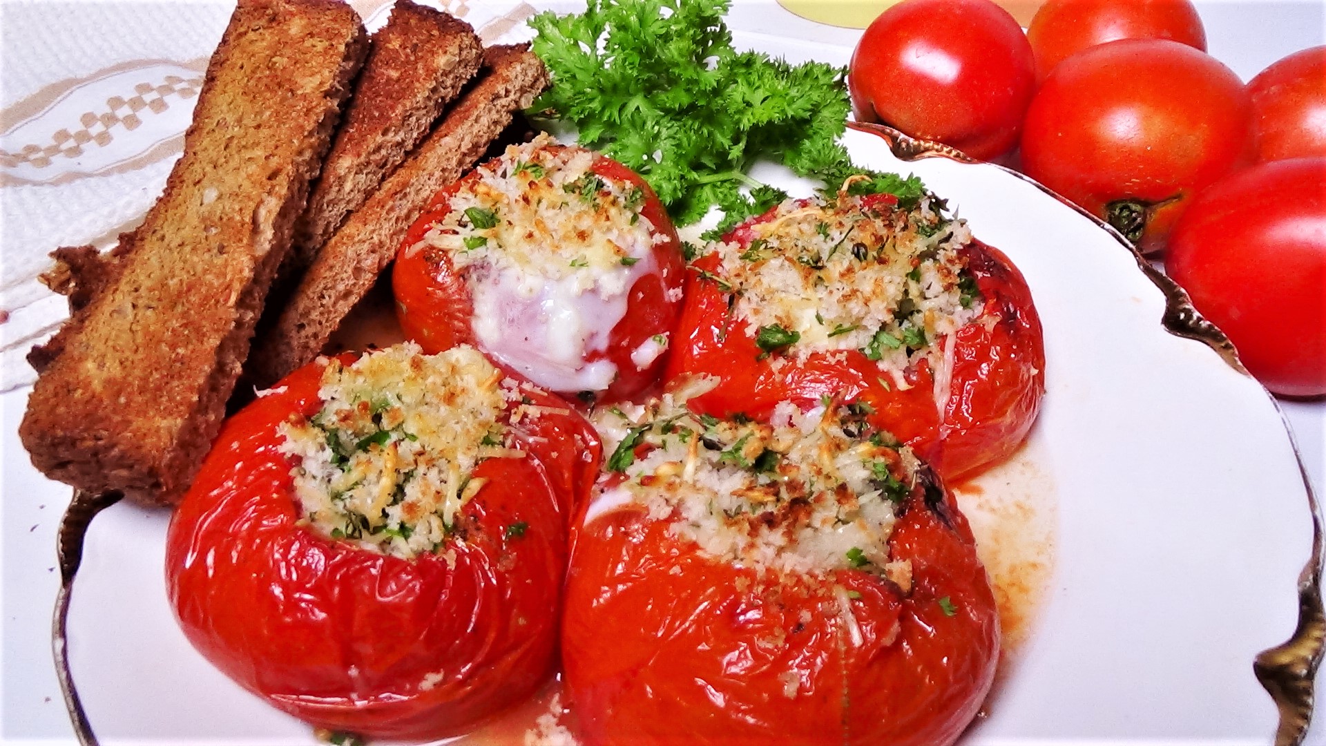 Baked Eggs in Tomatoes with Herbed Topping